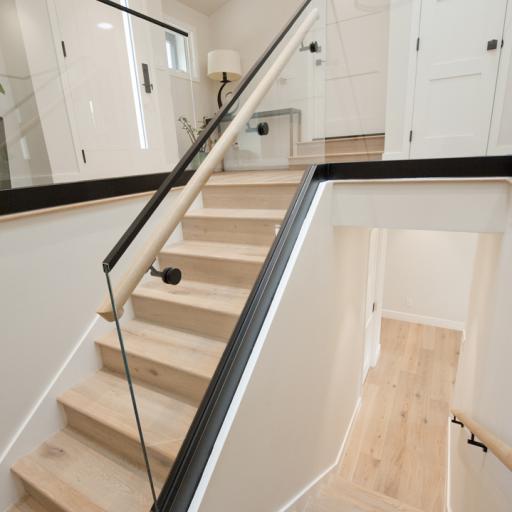 The modern stairway connecting the levels.