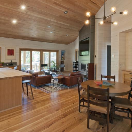 The open kitchen, living room, and dining area.