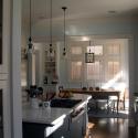View as entering the kitchen from the dining room & seeing the addition beyond. View as entering the kitchen from the dining room & seeing the addition beyond.